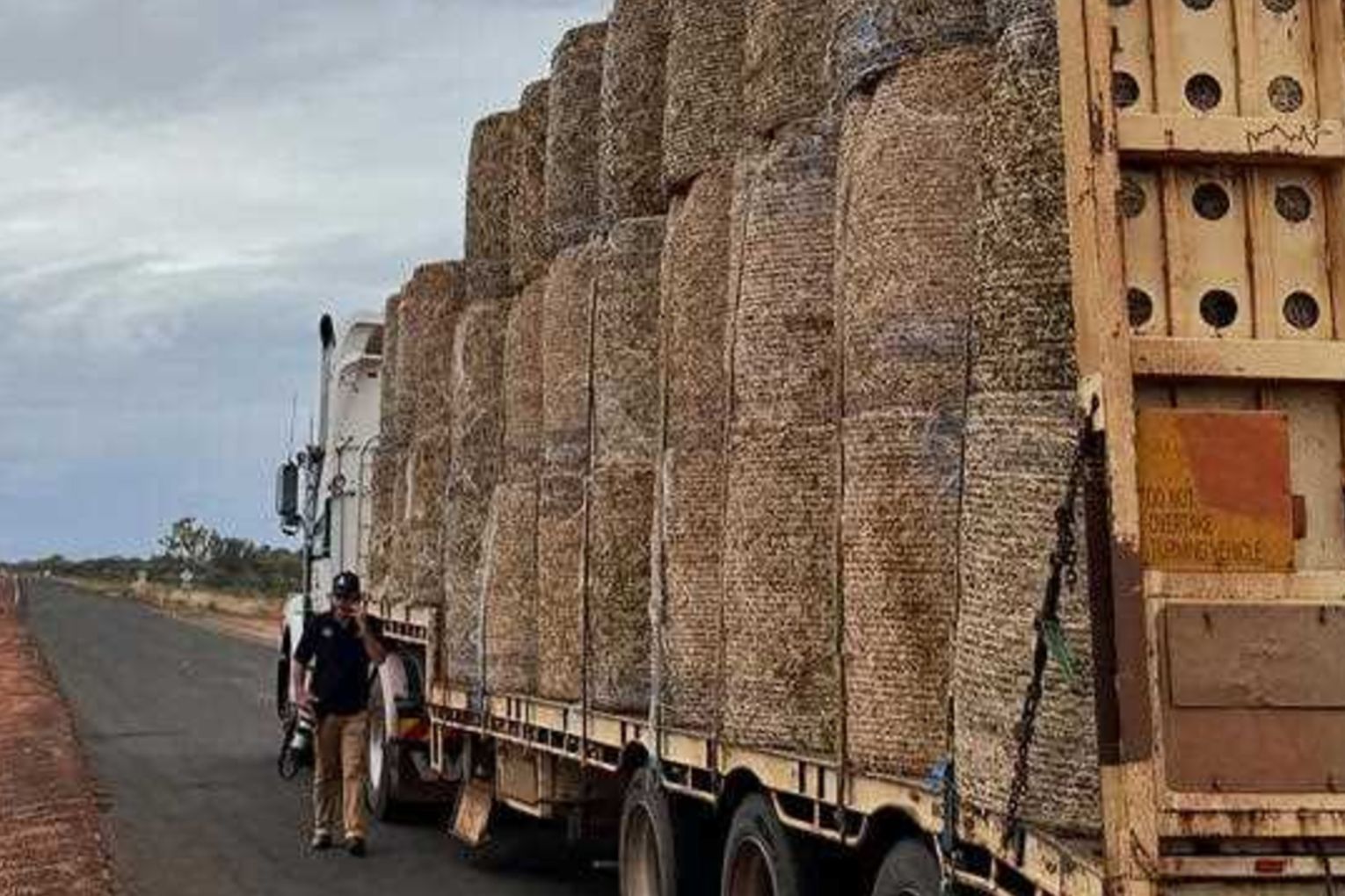 Hundreds of hay bales have been delivered to Queensland farmers after record floods. Photo: RuralAid