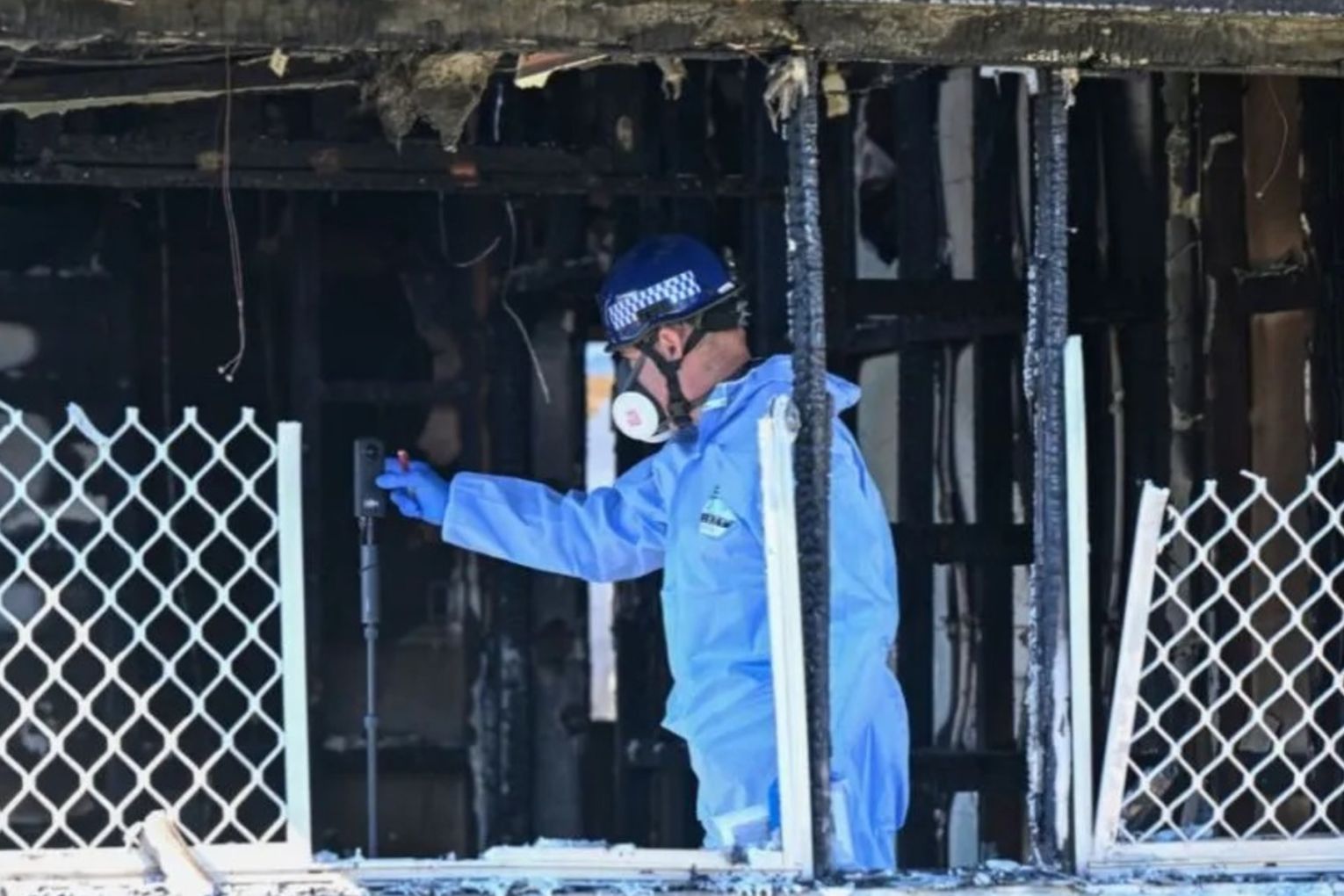 A body was found in the burnt-out remains of the house in Toowoomba, Queensland.