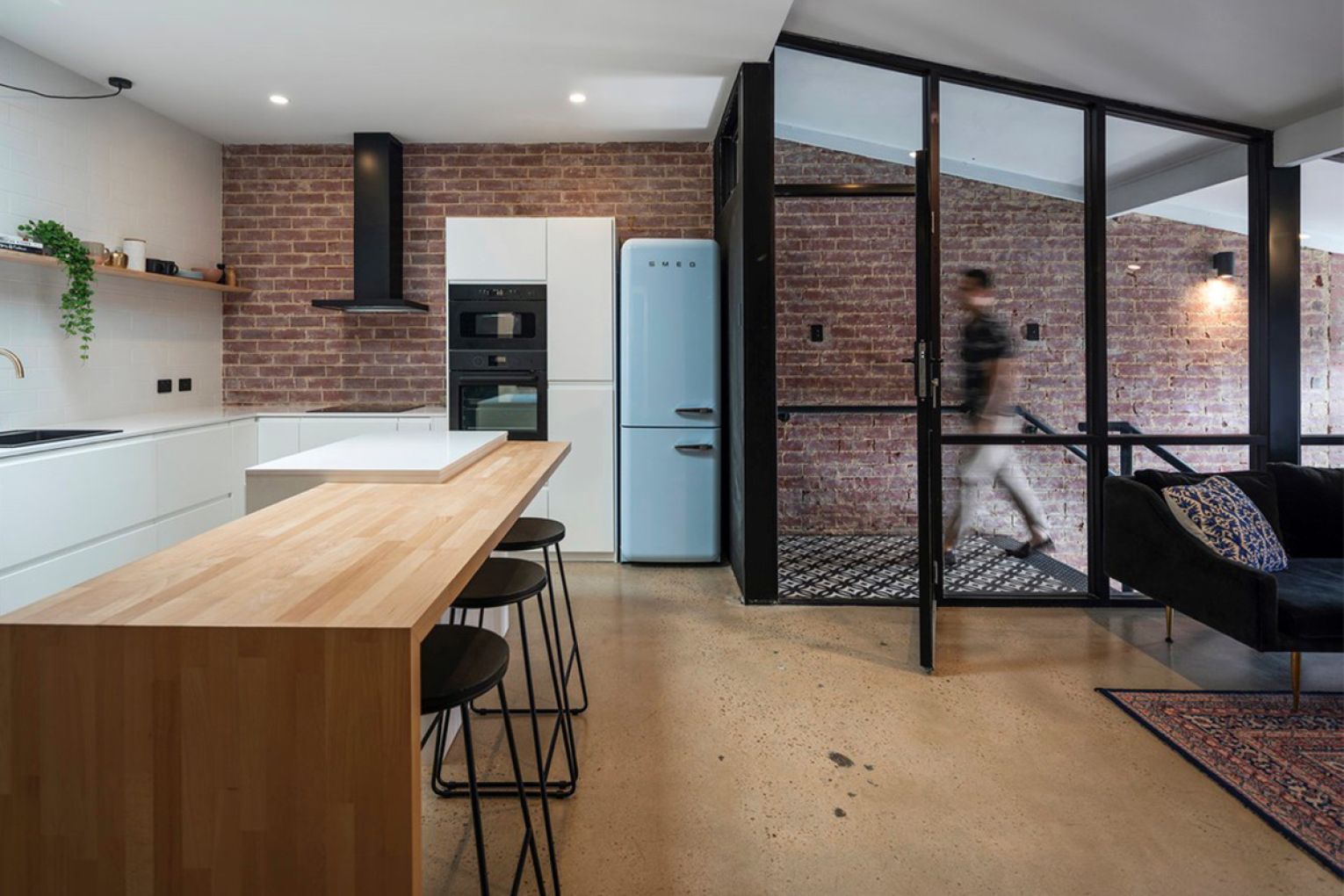 A tight $90,000 budget transformed this Gilles Street office building into housing. This photo: James Boulton.