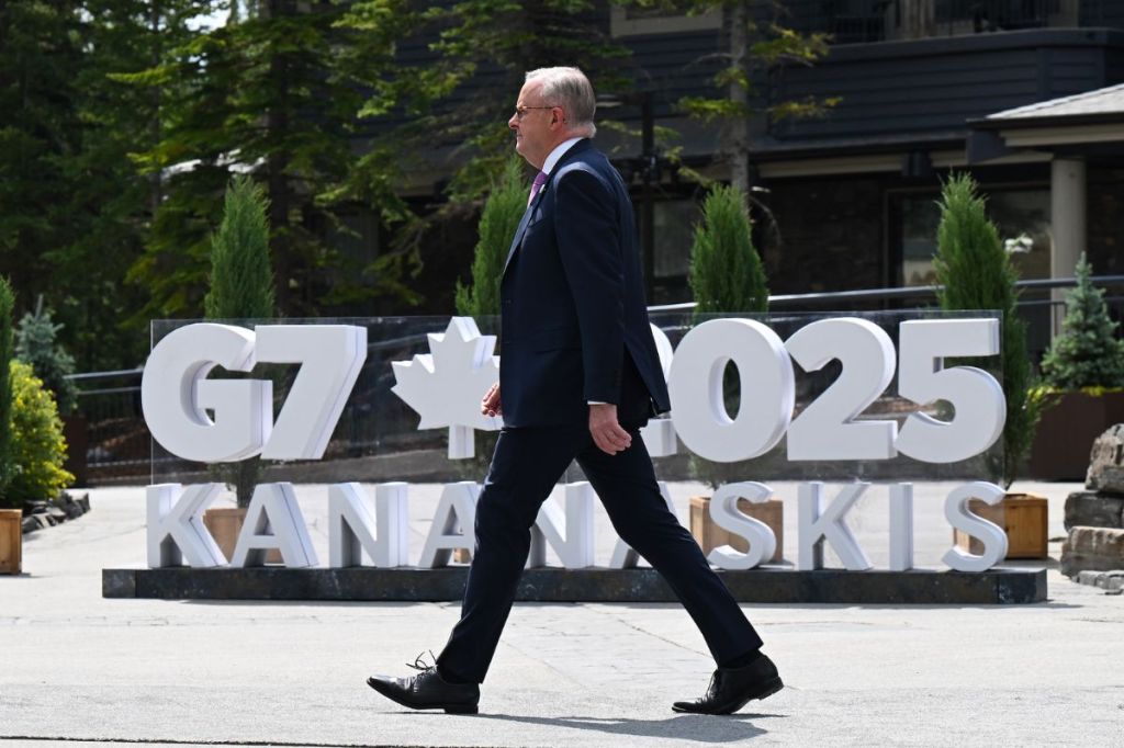 Australian Prime Minister Anthony Albanese walks after being greeted by Prime Minister of Canada Mark Carney during the welcome for Outreach partners at the G7 Leaders' Summit in Kananaskis, Alberta, Canada, Tuesday, June 17, 2025. Photo: AAP Image/Lukas Coch