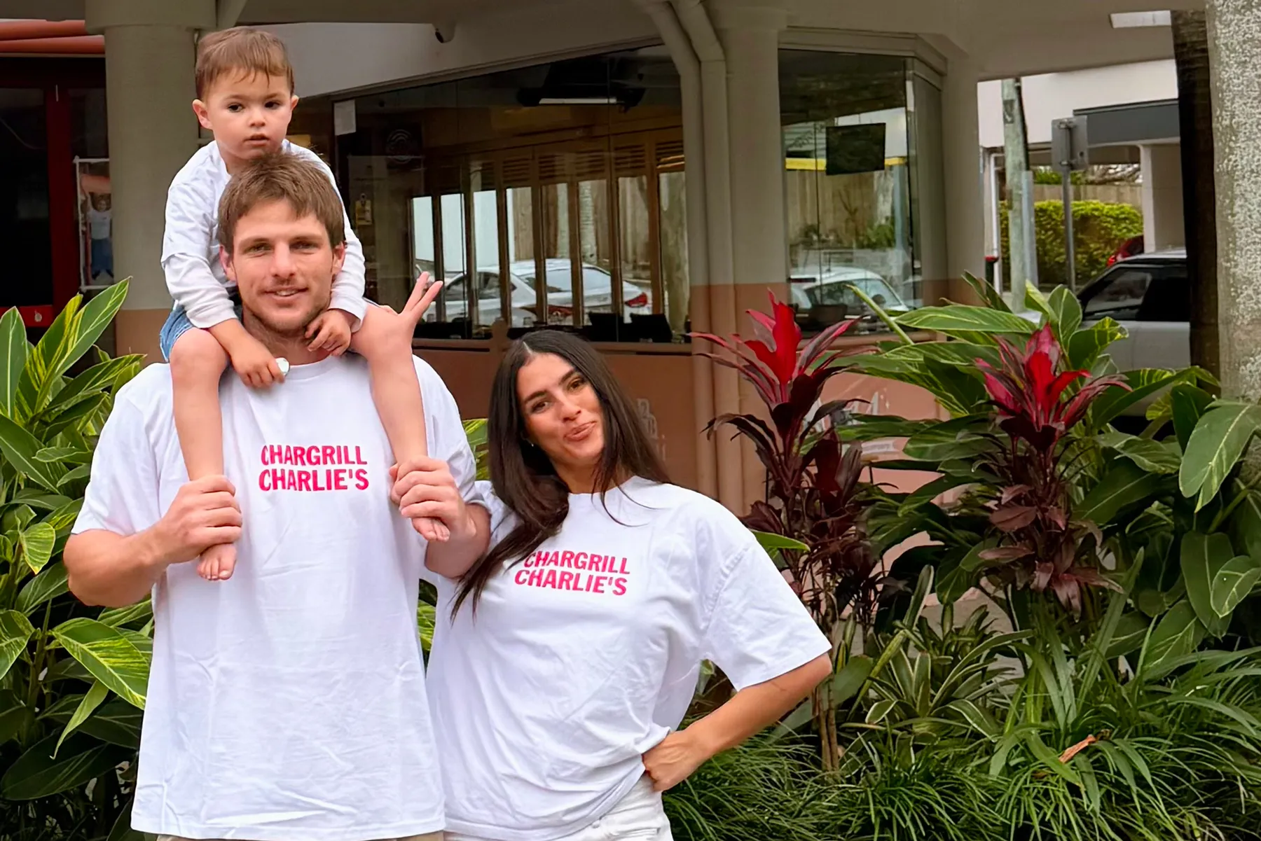 Jack Gosiewski, Avalon McRae and their son Goldie at Chargrill Charlie's in New Farm | Credit: image supplied