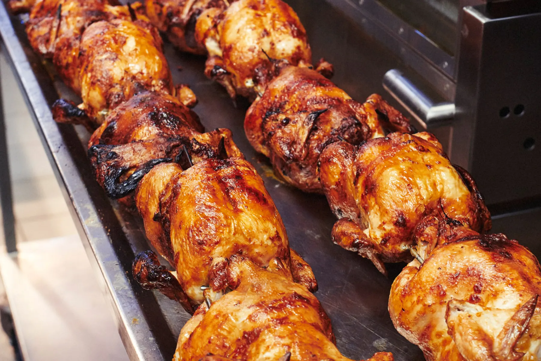 Rotisserie chickens at Chargrill Charlie's | Credit: image supplied