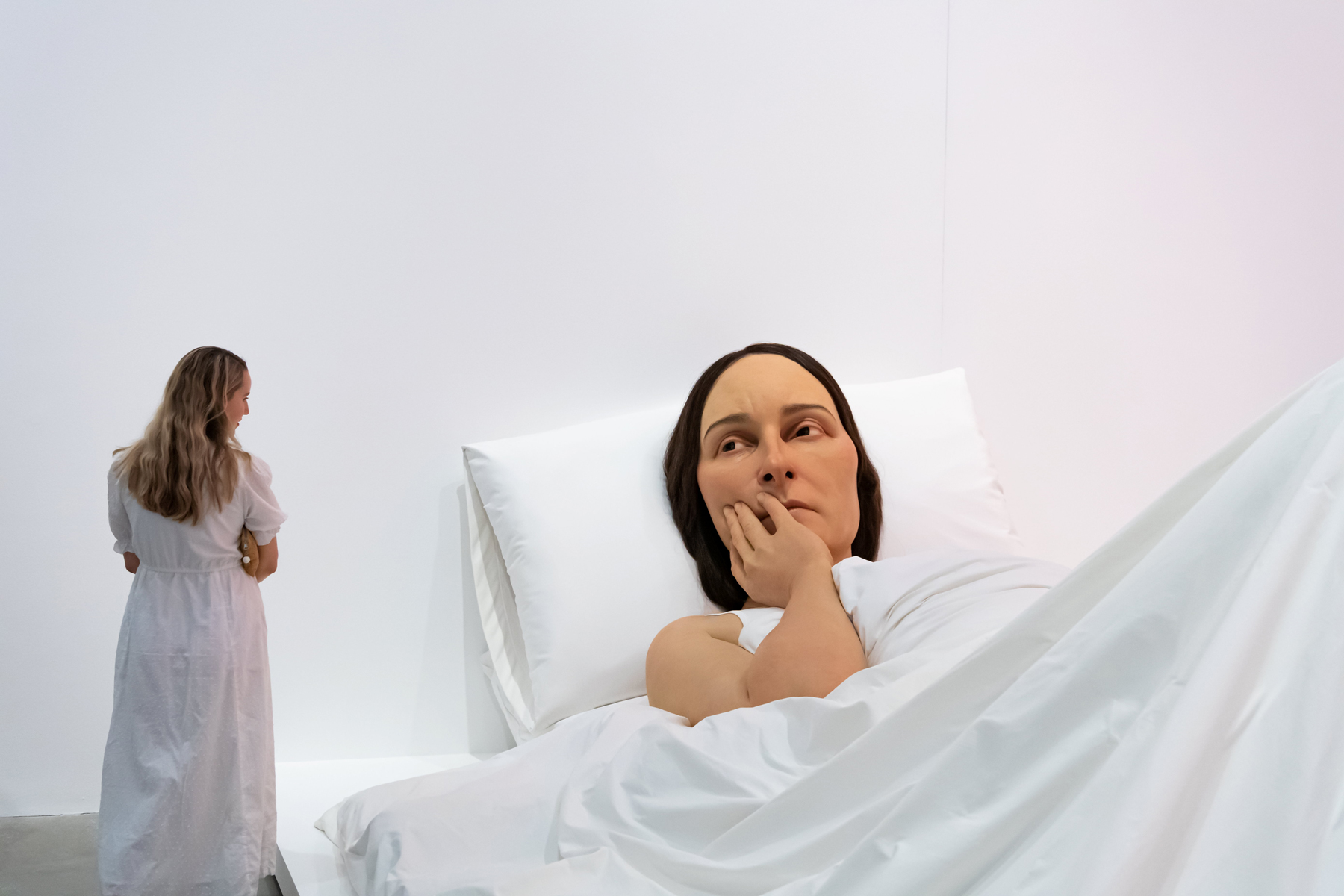 Ron Mueck / England b.1958 / In bed (installation view) 2005 / Mixed media / 161.9 x 649.9 x 395cm / Purchased 2008.  Queensland Art Gallery Foundation / Collection: Queensland Art Gallery | Gallery of Modern Art / © Ron Mueck