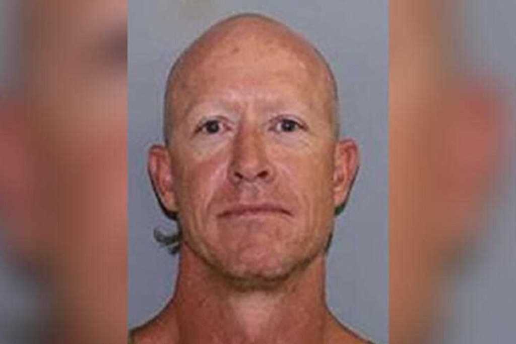 Michael Rennie, 43, is being hunted by police after escaping a prison farm on a tractor. Photo: Queensland Correctional Services