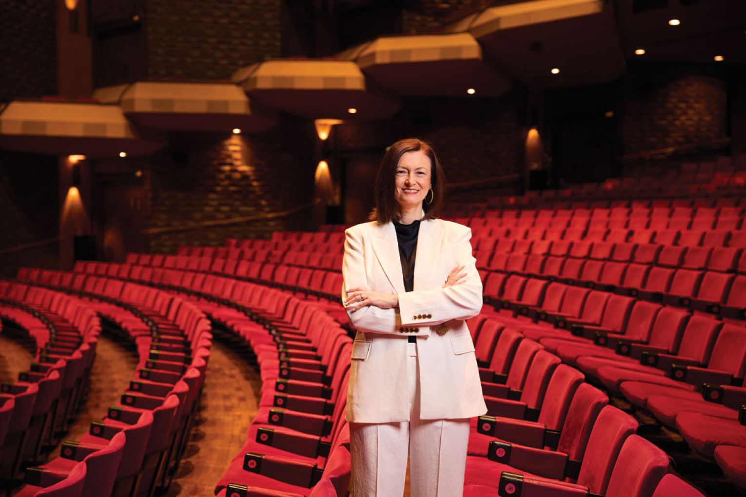 Kate, standing in the Festival Theatre, will bring her years of arts experience to her new role at the helm of the AFC.