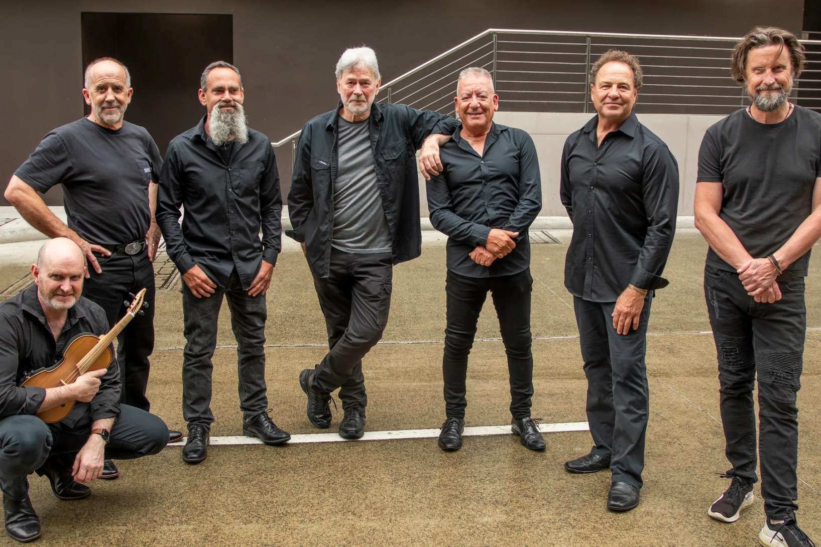 Singer John Schumann, centre, with The Vagabond Crew. Photo:  Glen Morgan / Supplied