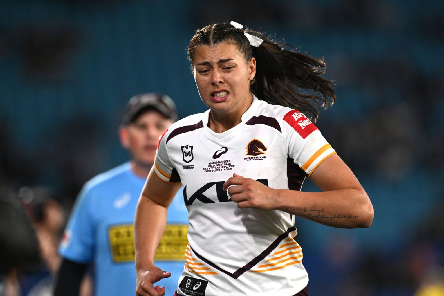 Brisbane debutant Reegan Hicks leaves the field after being sent off against Gold Coast. Photo: Dave Hunt/AAP
