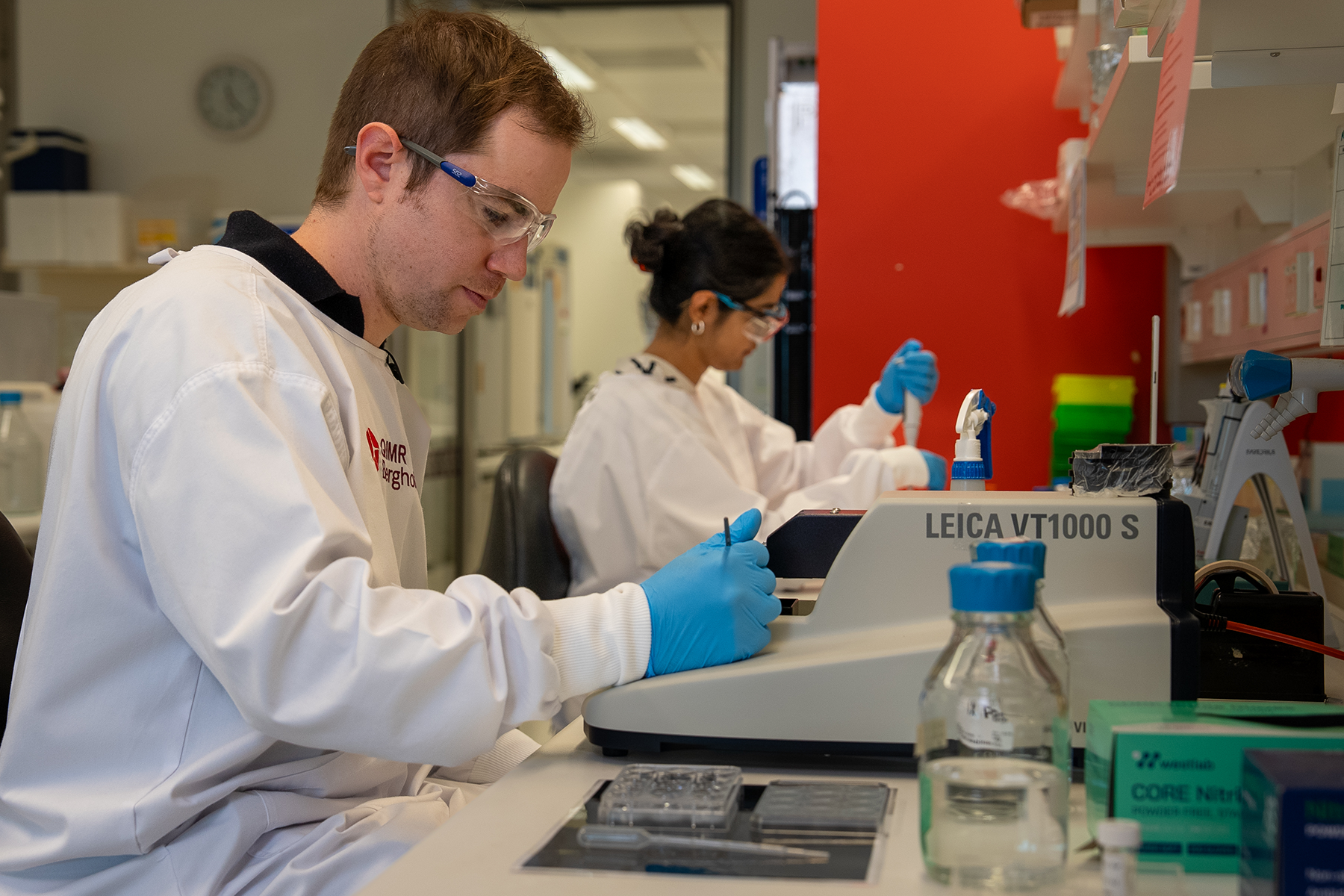 Dr Lachlan Harris in the lab at work. Photos: Supplied