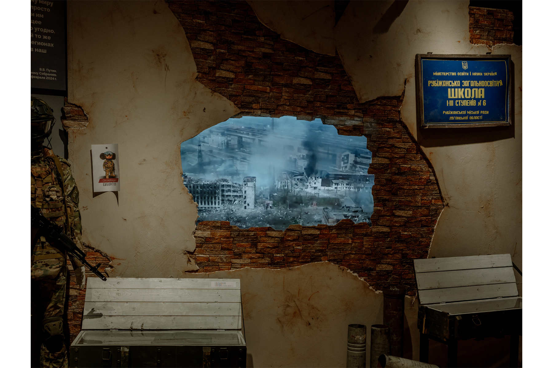 Footage from a drone attack on a Ukrainian target is displayed alongside trophies from the front, in an exhibition at a Tomsk local history museum. Tomsk, Russia, 2 April 2024.© Aliona Kardash, DOCKS Collective for Stern Magazine