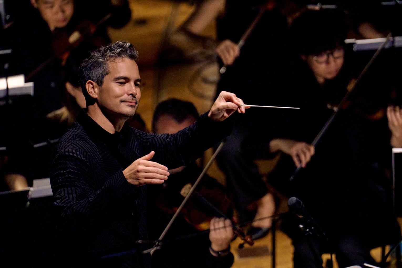Dane Lam, conducting The Magic Flute's Hong Kong season, has plenty going on as the artistic director of State Opera South Australia – including plans for the organisation's 50th anniversary next year. Photo: Opera Hong Kong / Supplied