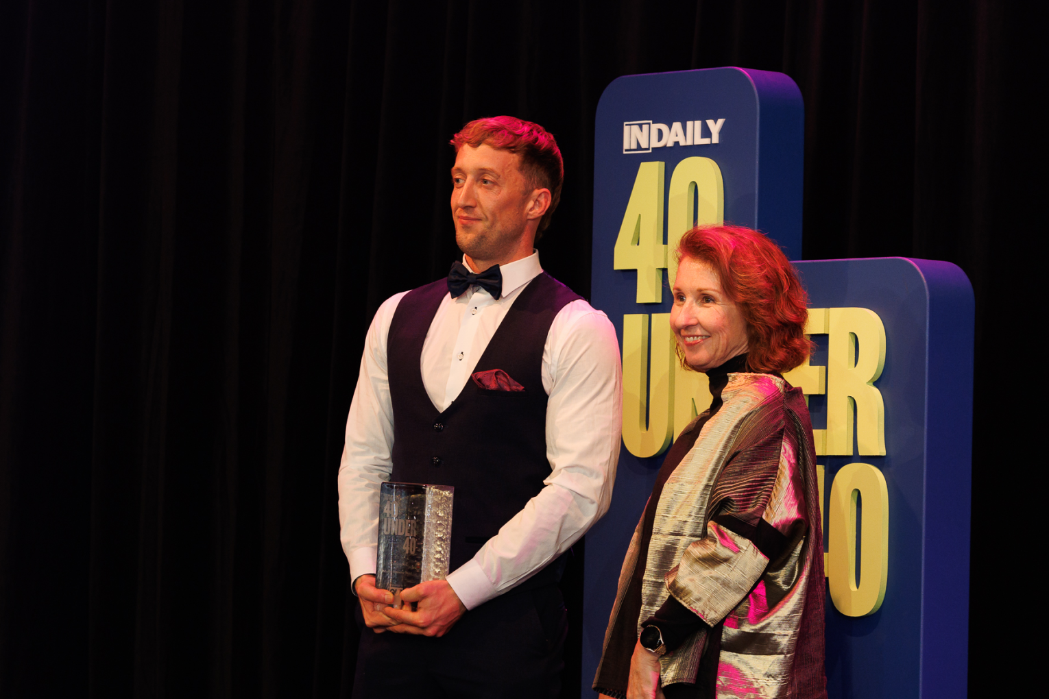Matt Crossan and QUT Professor Paige Hilditch-Maguire who presented the award