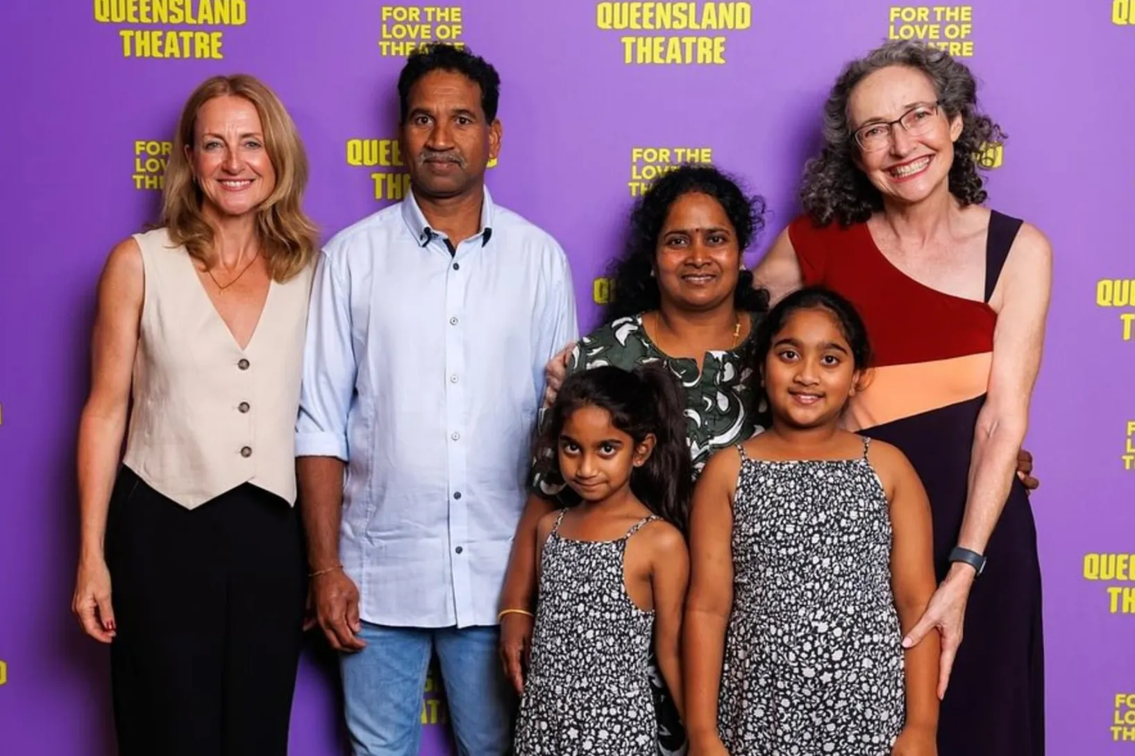 Belloo Creative's Caroline Dunphy and Katherine Lyall-Watson with the Nadesalingam family, the subject of the play, Back to Bilo. Photo: Josh Woning