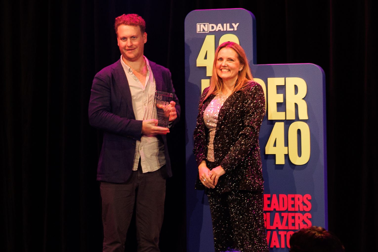 Drew Campbell and Sarah Smith who presented the award