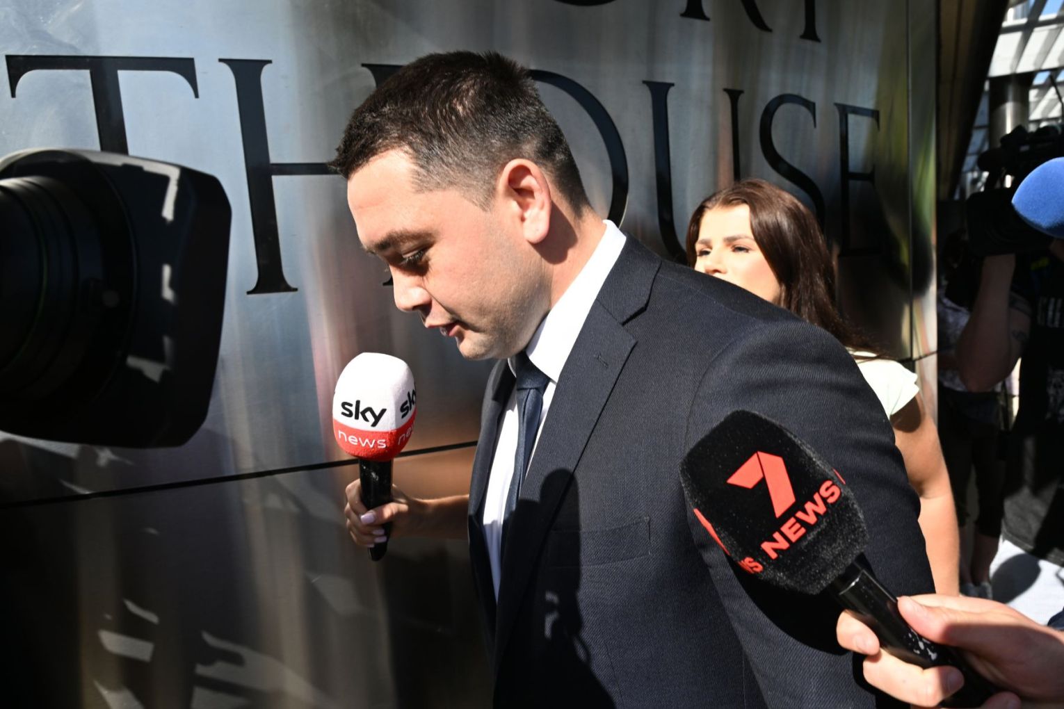 South Sydney Rabbitohs player Brandon Smith walked past a media throng as he arrived at court. Picture: Darren England/AAP Photos