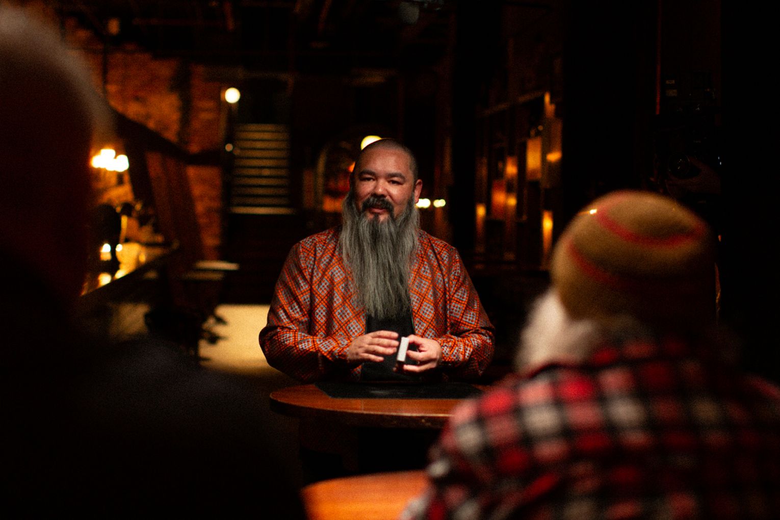 Damien Shen performs a special sleight of hand magic trick as part of his new exhibition. Photo: Piri Eddy / Supplied