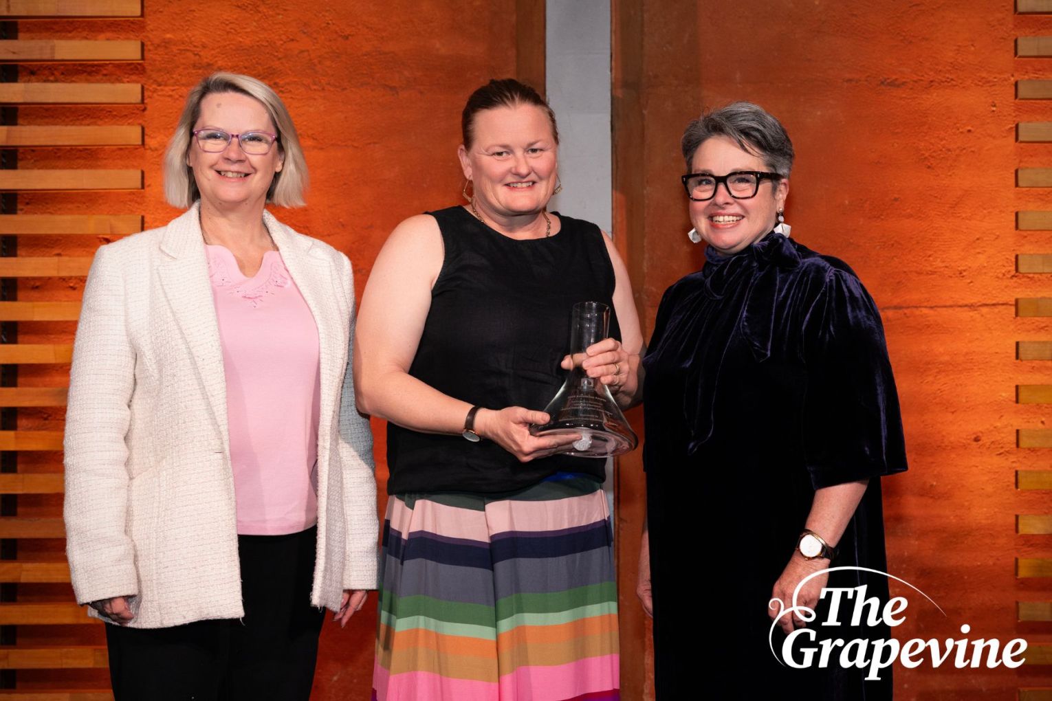 SAWIA
Environment Excellence Awards Individual Champion
winner Jessica Williams,
from Kingston Estate Wines, with SAWIA President
Kirsty Balnaves and award sponsor
the
Department of Primary Industries and Regions, represented by the Hon Clare Scriven MLC. Photo: Supplied