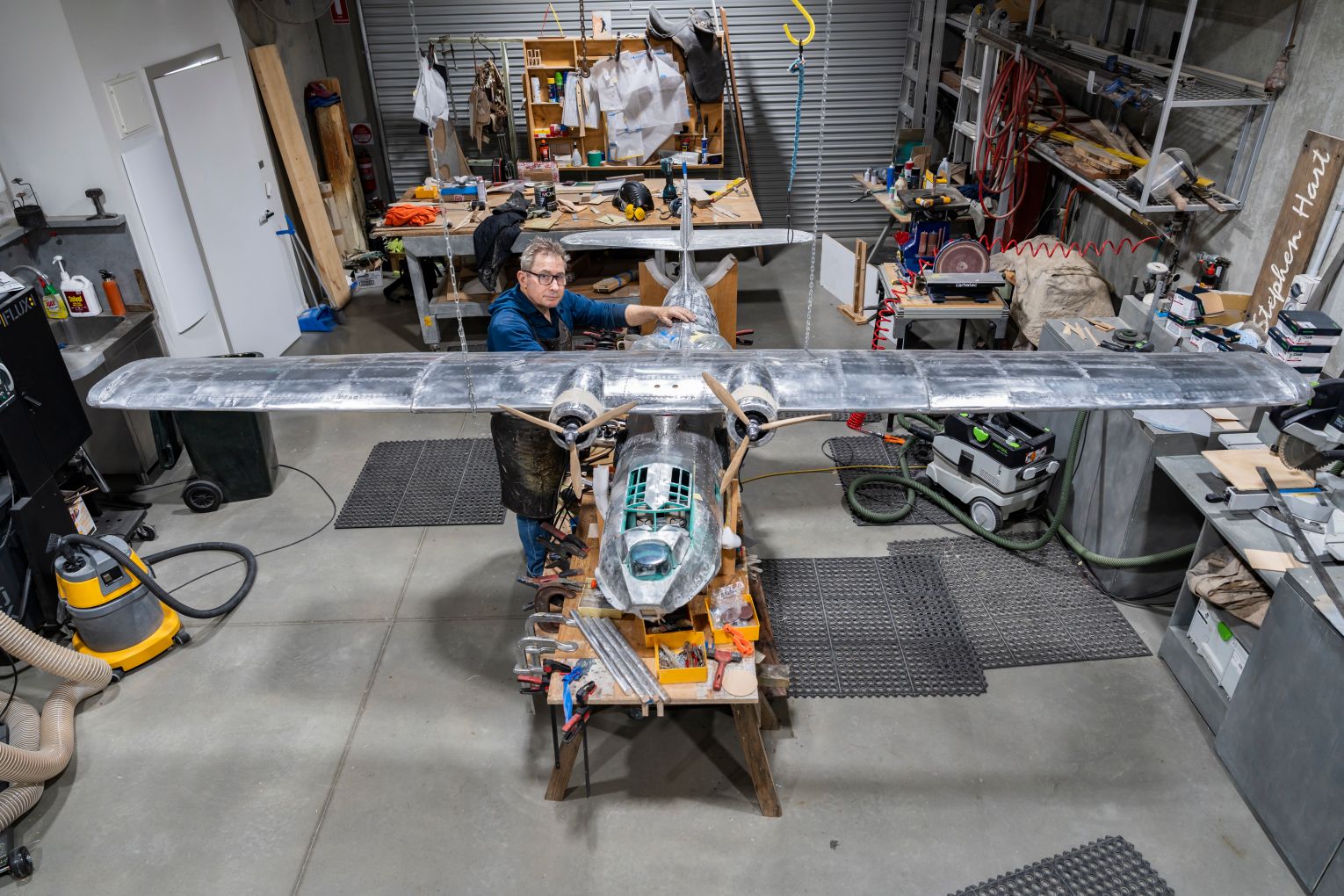 Stephen Hart at work on his Catalina in his Brisbane studio. Photo: Louis Lim