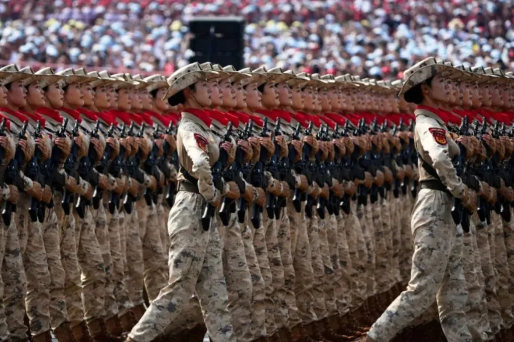 Ex-premier joins guests at China's military spectacle