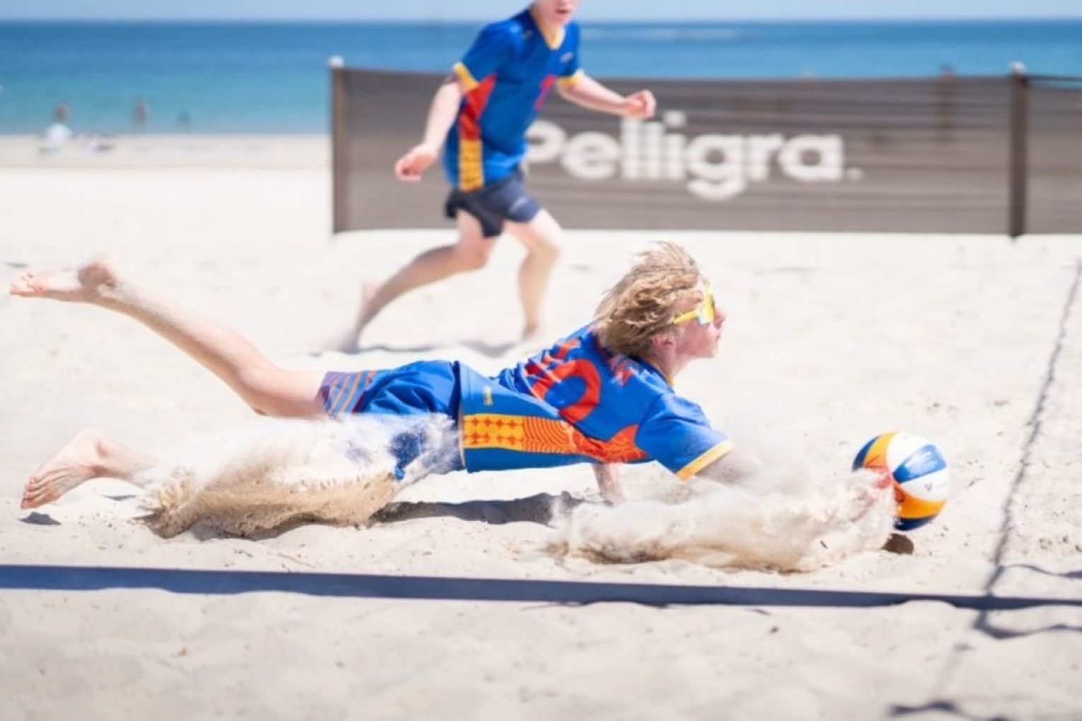 Currently, beach volleyball players in SA are taking precautions like carefully clearing areas of seaweed and avoiding foam due to Algal Bloom. A years-awaited city beach site would allow them to play on despite climate conditions. Photo: Volleyball SA