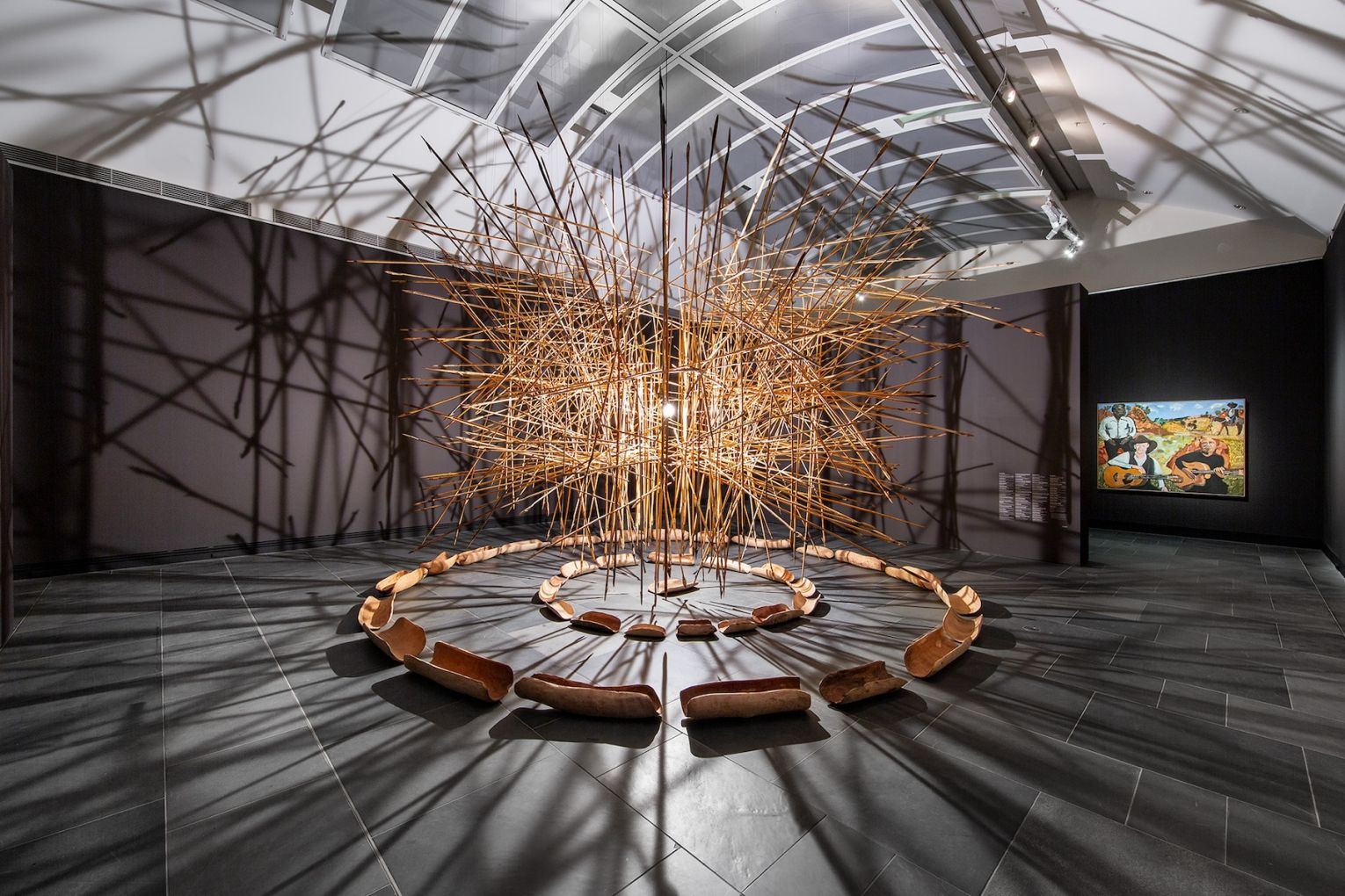 Installation view: Too Deadly: Ten Years of Tarnanthi, featuring Kuḻaṯa Tjuṯa by APY Art Centre Collective and Albert Namatjira, Slim Dusty and Archie Roach on Country by Vincent Namatjira , Art Gallery of South Australia, Adelaide. Photo: Saul Steed / Supplied