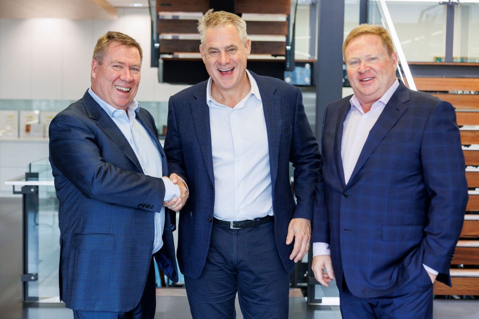 Ahrens has acquired a Victorian construction firm in a bid to grow its presence on the East Coast. L-R: Ken Vaughan, Stefan Ahrens, Matthew Vaughan. Photo: Supplied