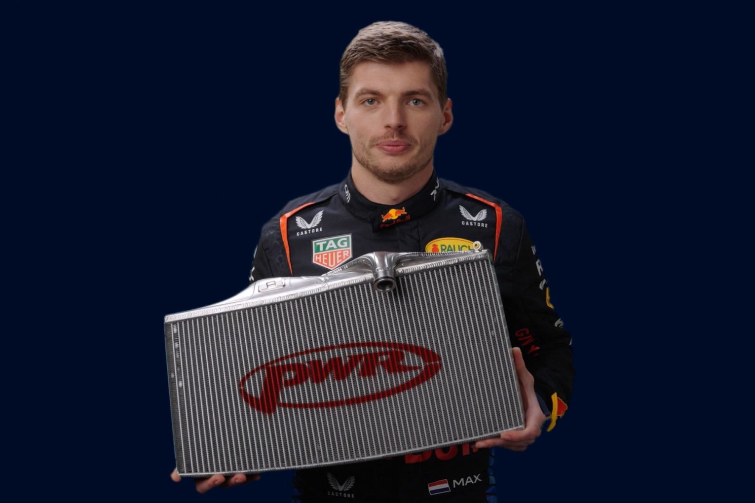 PWR's cooling tech is used by every Formula 1 team in the world. Pictured here with F1 driver Max Verstappen. Photo: PWR