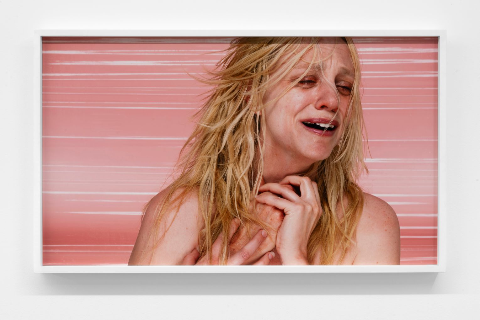 Rosemary Laing's a dozen useless actions for grieving blondes #5, 2009, photograph, is on show at the IMA.