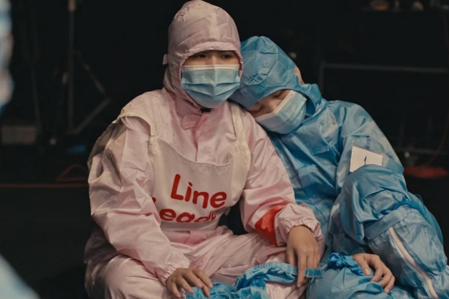 Factory Workers resting after a long day in She. Photo: Supplied
