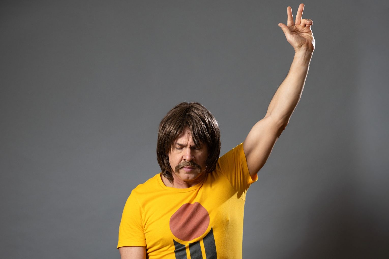 Denis Carnahan as 1982 - one of the characters in his show, Cricket The Musical.