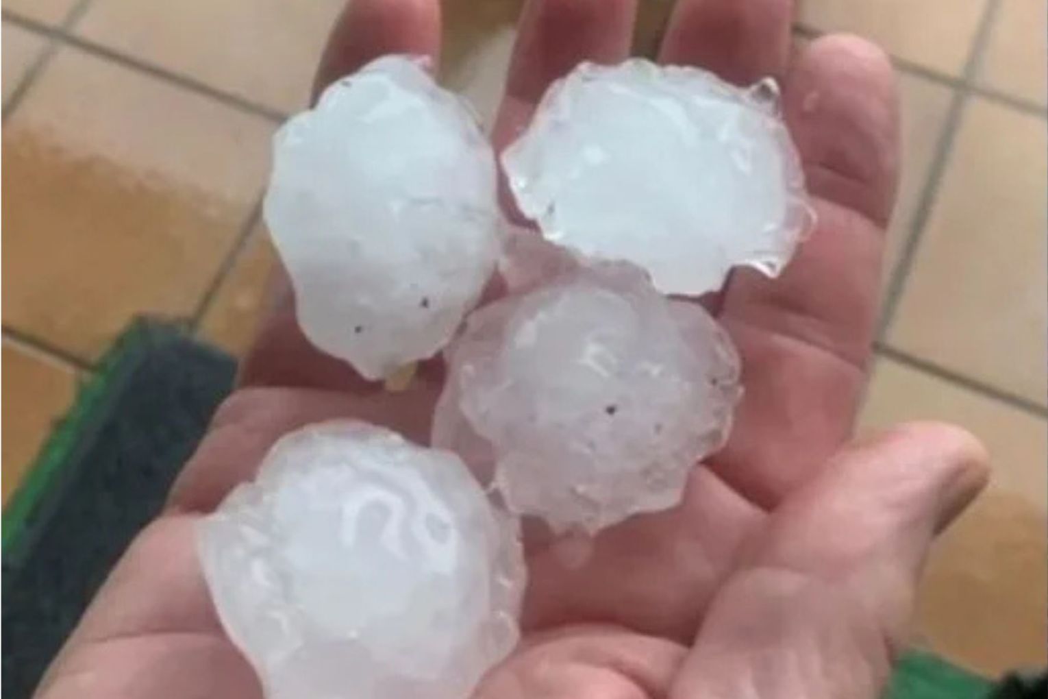 Huge hailstones have battered Queenslanders