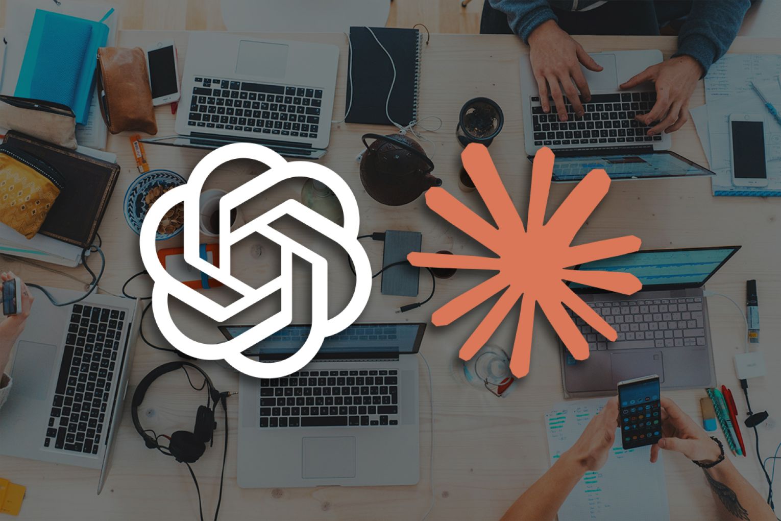 Anthropic and OpenAI are spending millions on human creativity and traditional brand building. Photo: Unsplash. Graphic: Jayde Vandborg.