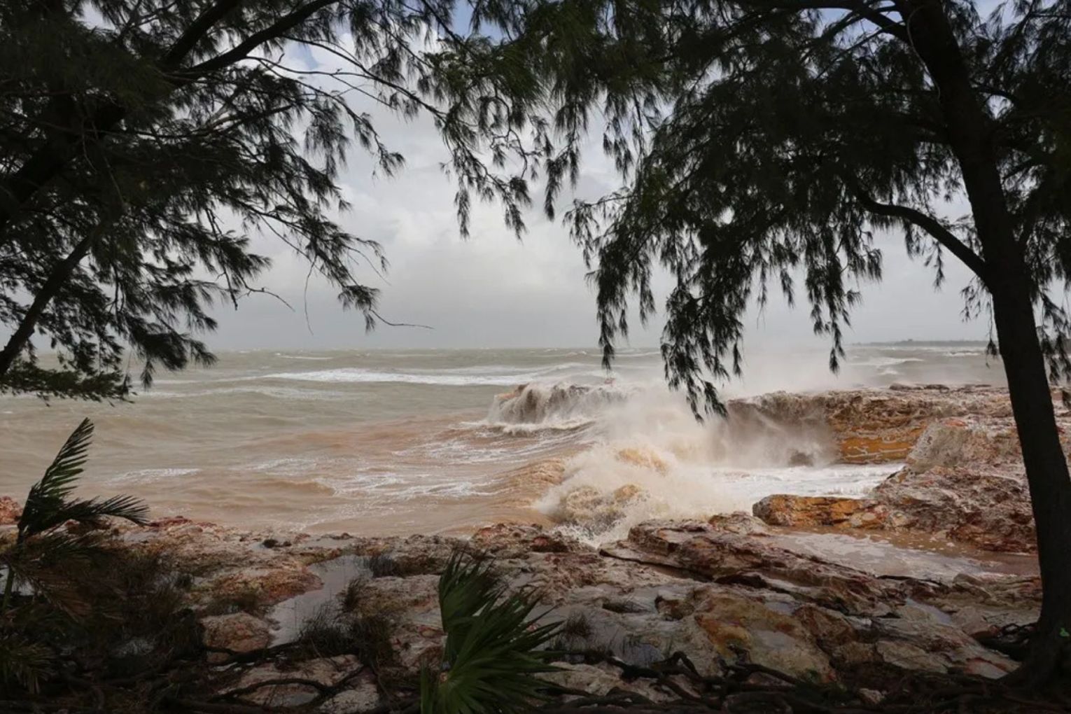 Tropical Cyclone Fina is already hitting island and coastal communities as it approaches Darwin.