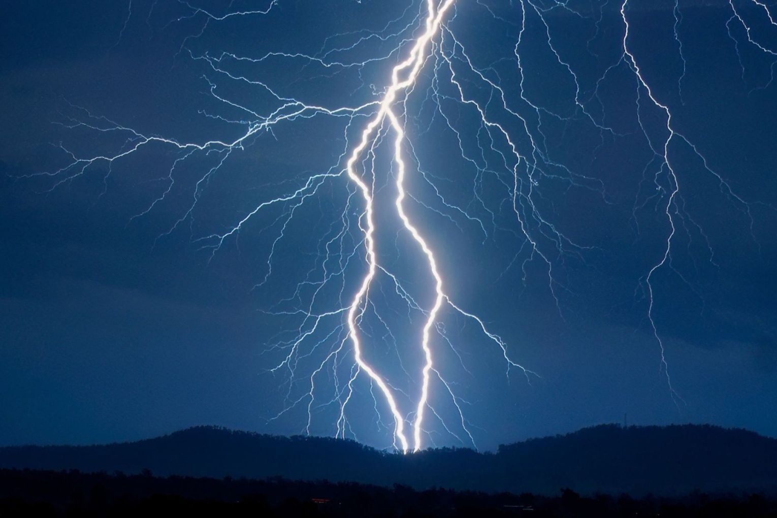 Lightning strikes near Peak Crossing, south of Ipswich, Queensland, on Wednesday. Picture: Murray Fox Photography via Higgins Storm Chasing 