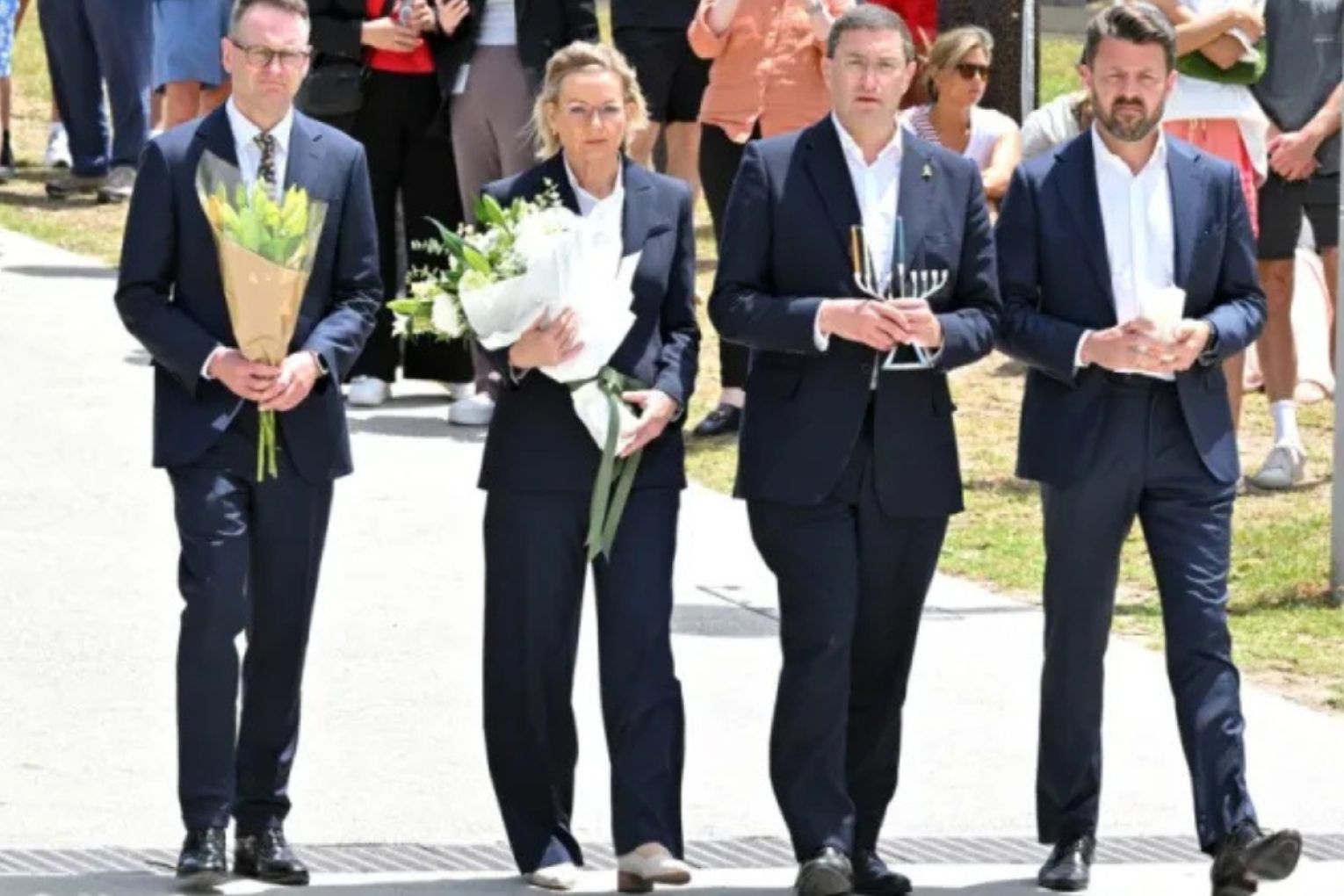 Opposition Leader Sussan Ley and frontbenchers Andrew Bragg, Julian Leeser and Jonathon Duniam at Bondi Beach. Photo: AAP