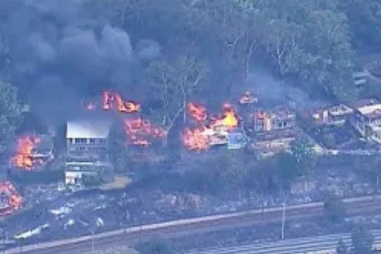 Thumbnail for Firefighter dies as communities stay on high alert