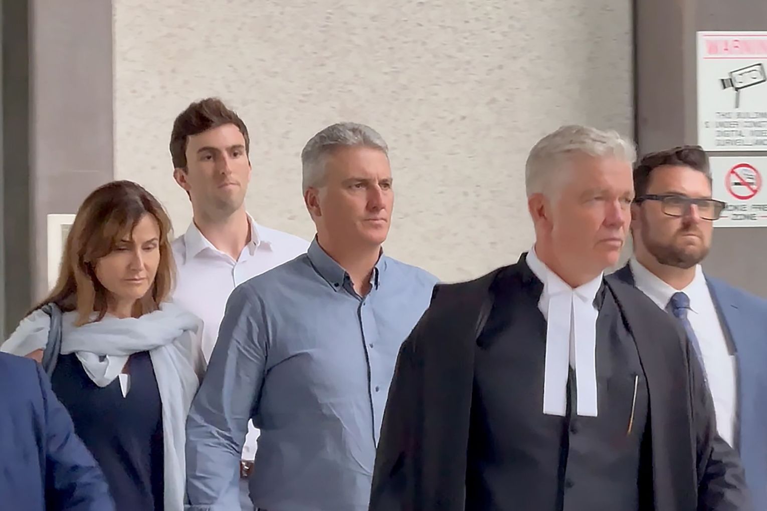 Former Olympic physio Peter John Wells (centre) is accused of sexual contact with five girls. Picture: Rex Martinich/AAP Photos