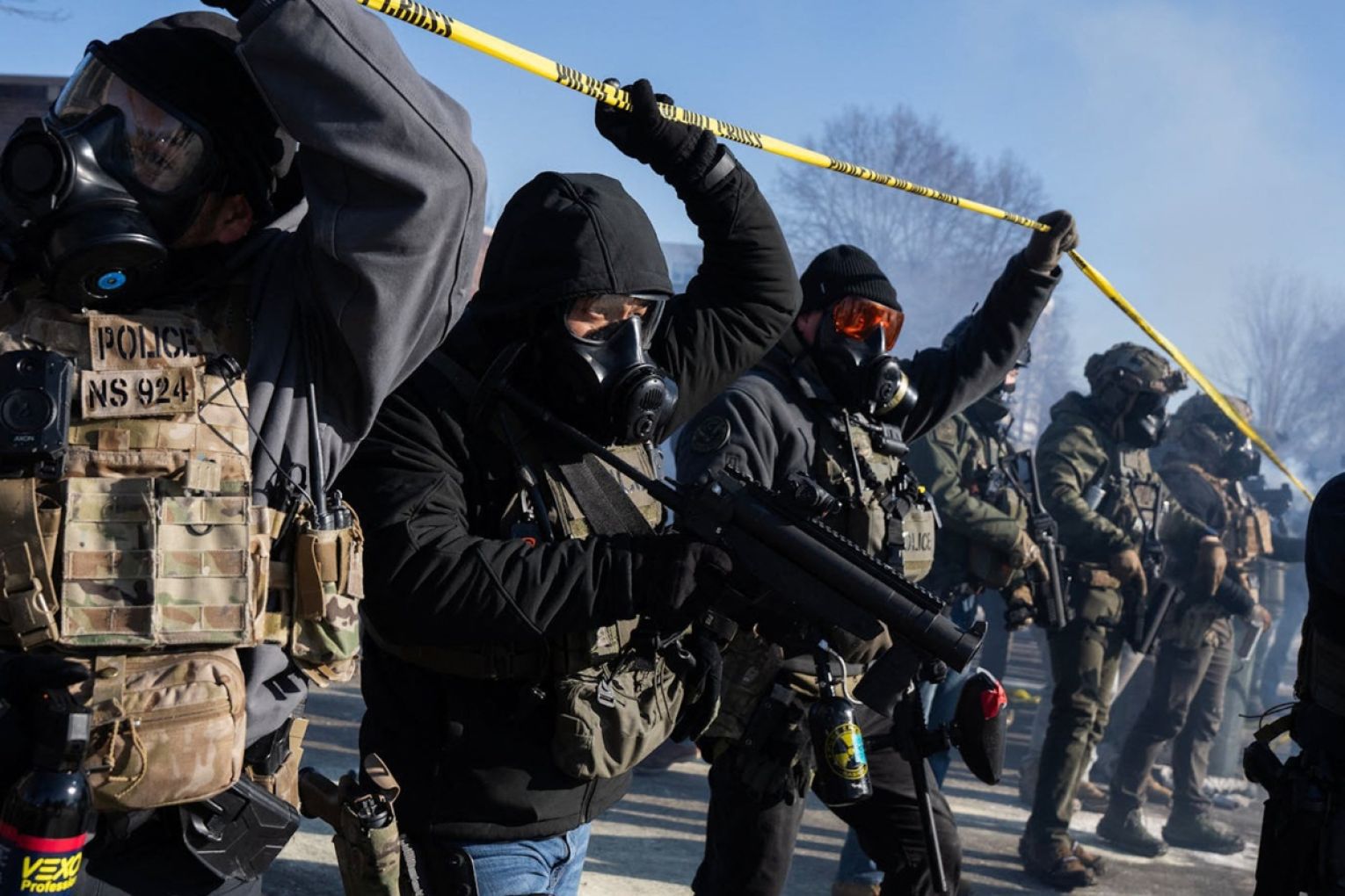 Federal agents move toward protesters at the scene where a federal agent shot and killed Alex Pretti in south Minneapolis on Saturday, January 24, 2026. Picture: Richard Tsong-Taatarii/The Minnesota Star Tribune/TNS