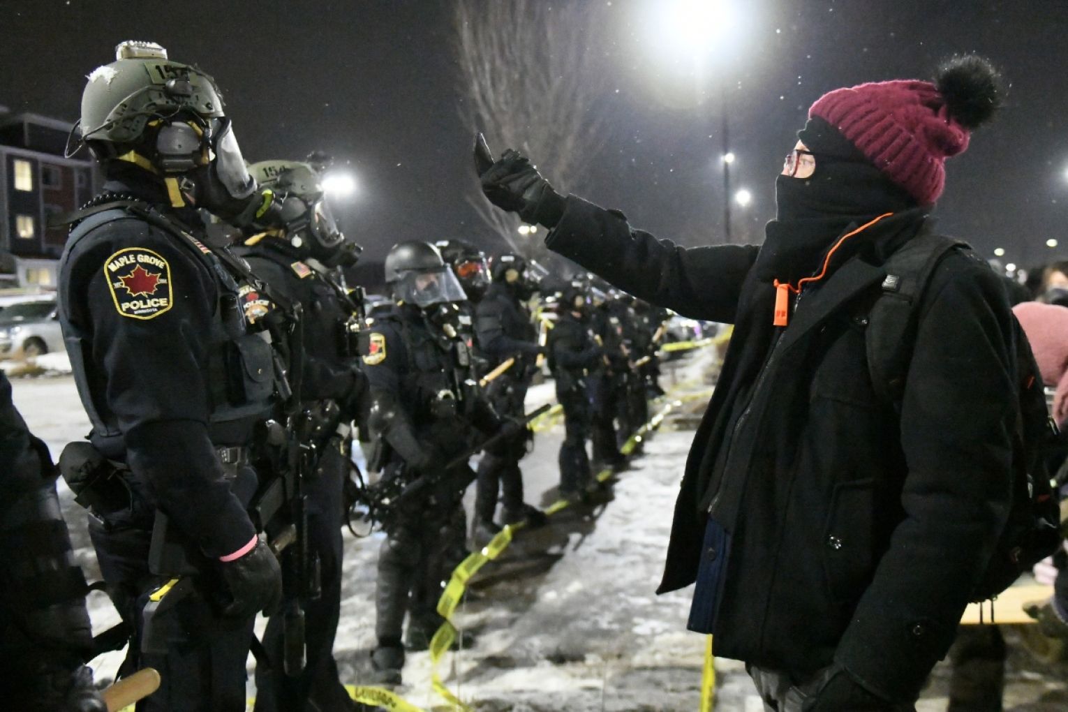 Protesters confront police outside the hotel where top Border Patrol official Gregory Bovino was believed to be staying in Minneapolis, Minnesota. Bovino is expected to leave Minnesota after Alex Pretti was the second person killed by federal officers in Minneapolis this month. Picture: EPA/CRAIG LASSIG