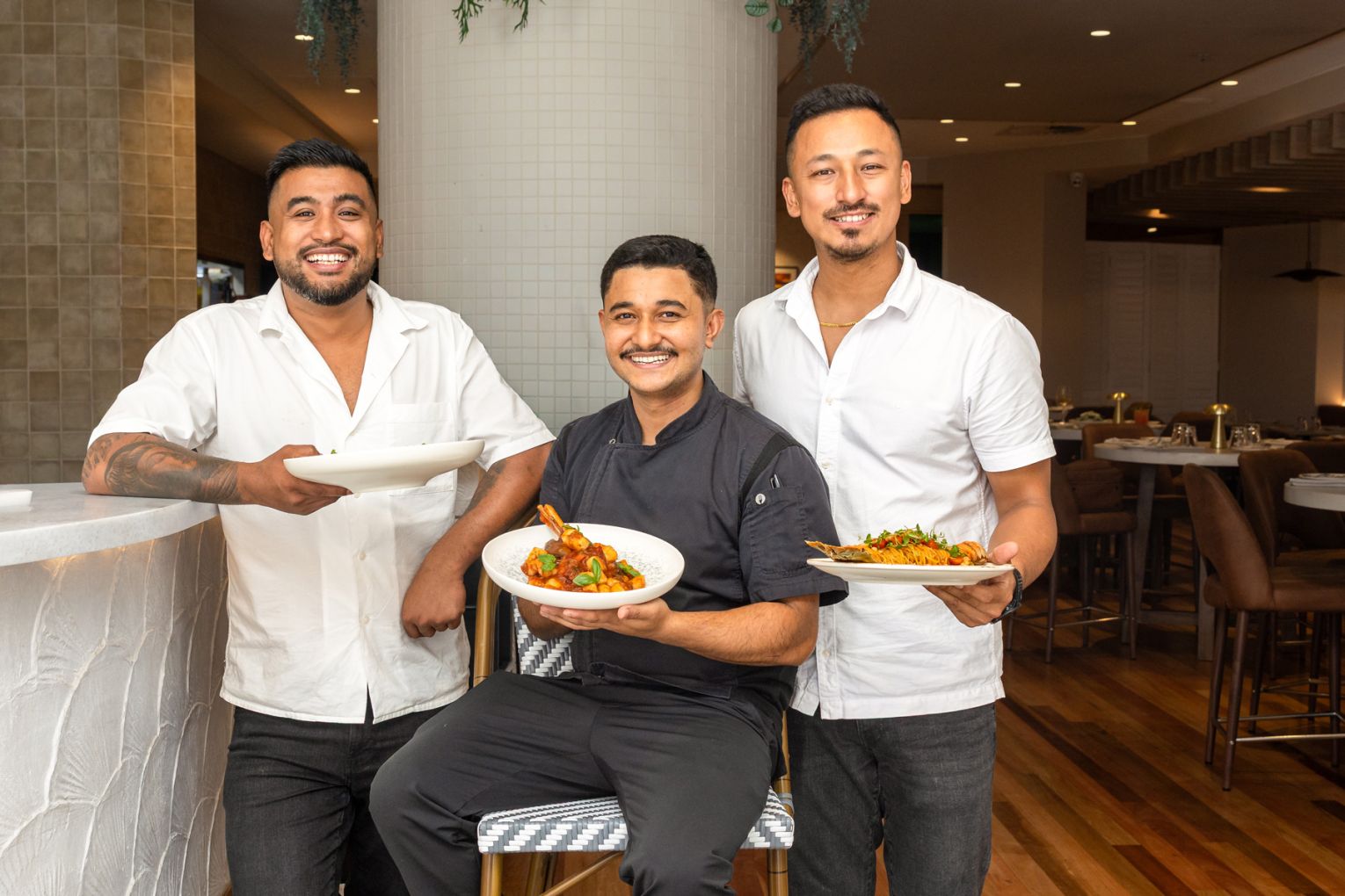 Owners Sushil Maharjan (left) and Praywol Maharjan (right) alongside head chef at Oro by Sogno Italiano in Broadbeach, image credit: Jade Quinlivan