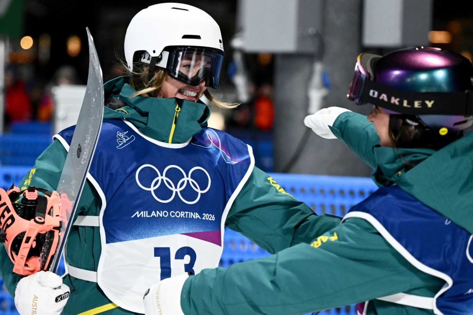 Meila Stalker (left) and Ally Hickman of Australia embrace during the Women’s Snowboard Big Air qualification round at the Livigno Snow Park, on day 2 of the 2026 Milano Cortina Winter Olympic Games in Italy. Picture: AAP/Dan Himbrechts