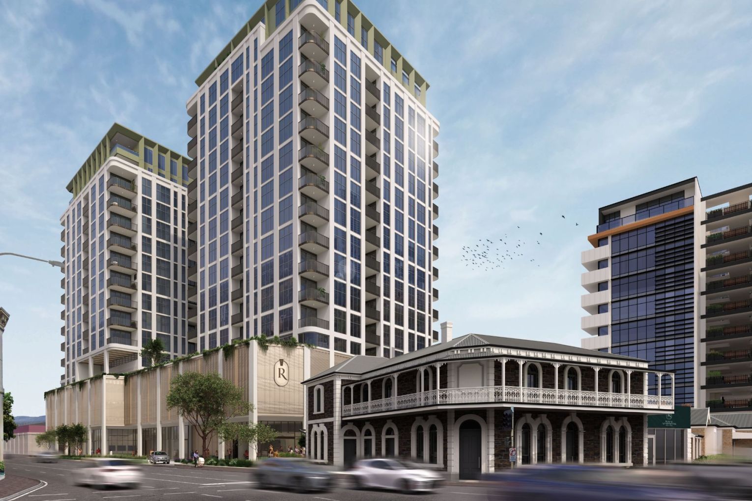 A render of what the new development will look like, with two apartment towers behind the revitalised pub.