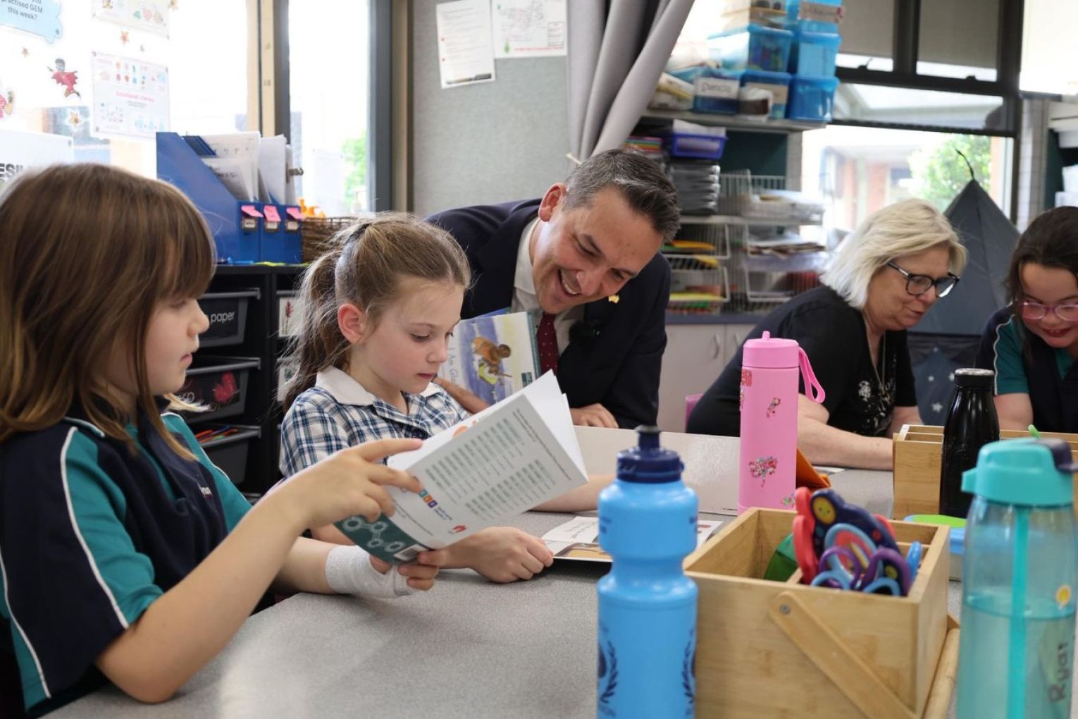 80,000 South Australian students would have sat their NAPLAN tests today, but were delayed due to tech issues. This picture: Education Minister Blair Boyer with students/via Facebook. 