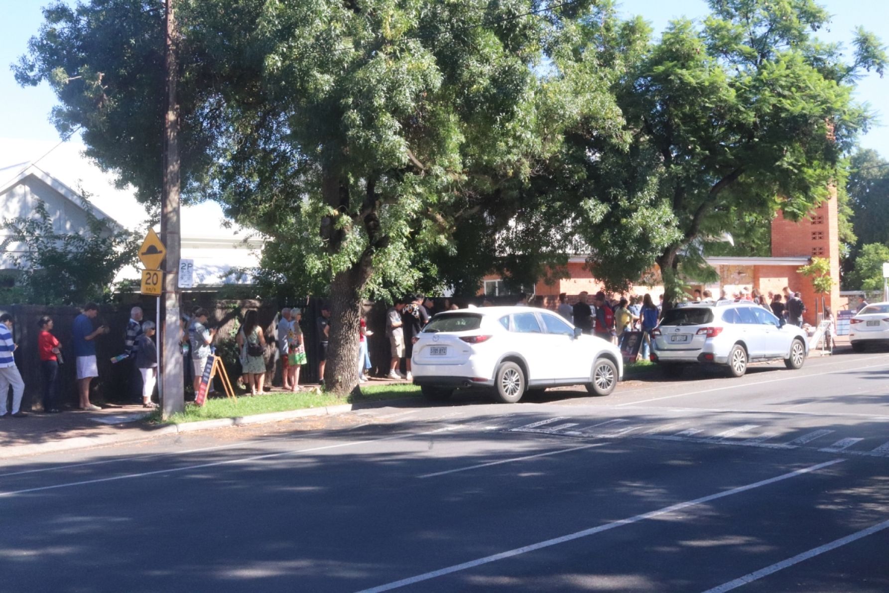 Voters waiting in line at St Peter Claver Church Hall in Dulwich. Photo: Charlie Gilchrist/InDaily