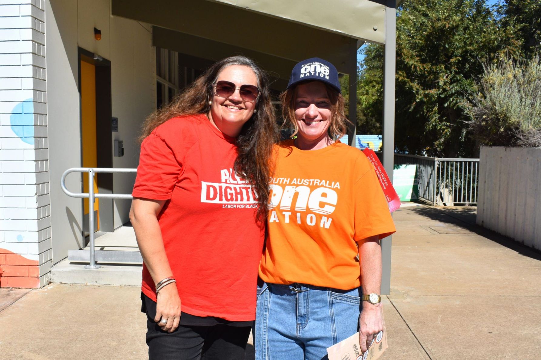 Debra Von Der Borch (Labor volunteer) and Leticia Mooney (One Nation volunteer) at Hallett Cove polling booth. This picture: Helen Karakulak/InDaily 