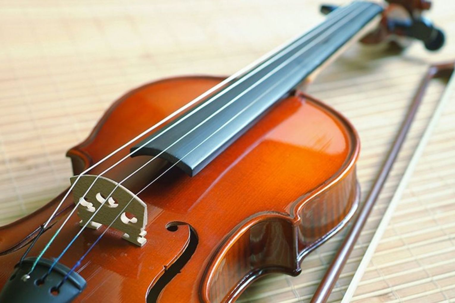 Violinist Lachlan Bramble says the emotional power of an orchestra can't be matched by loudspeakers. Picture: AAP