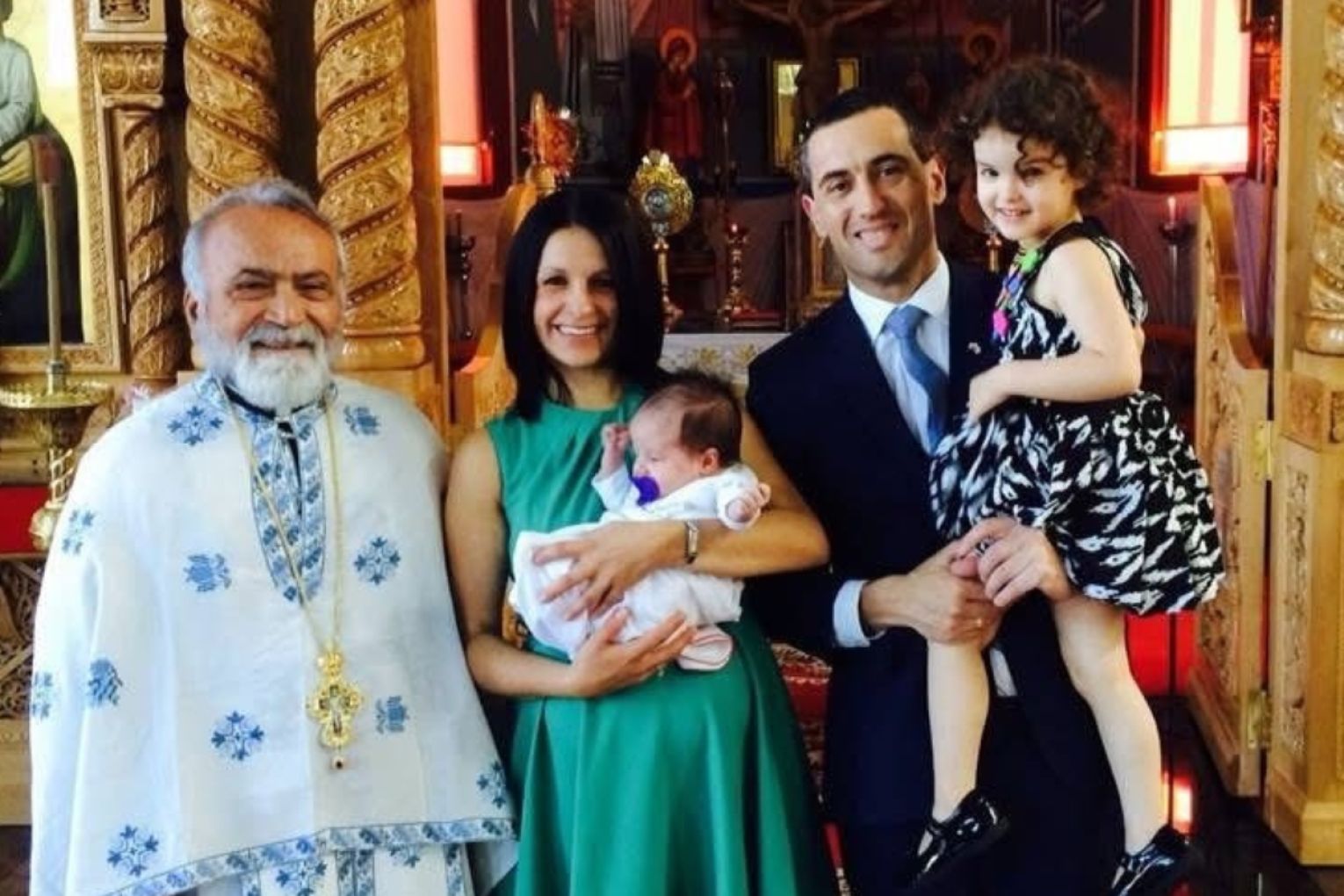 Treasurer Tom Koutsantonis pictured with Father Diogenis Patsouris and his wife Anthea and two children. Picture: Tom Koutsantonis' Facebook page.