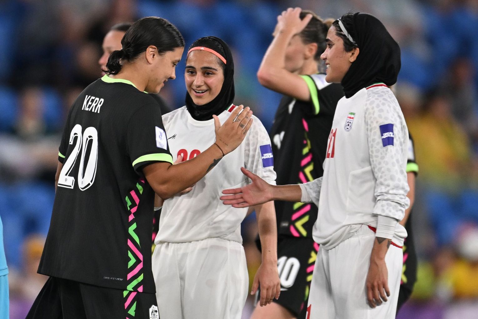 Sam Kerr salutes Iran opponents Sara Didar and Golnoosh Khosravi after Australia's Asian Cup match. Picture: Dave Hunt/AAP PHOTOS
