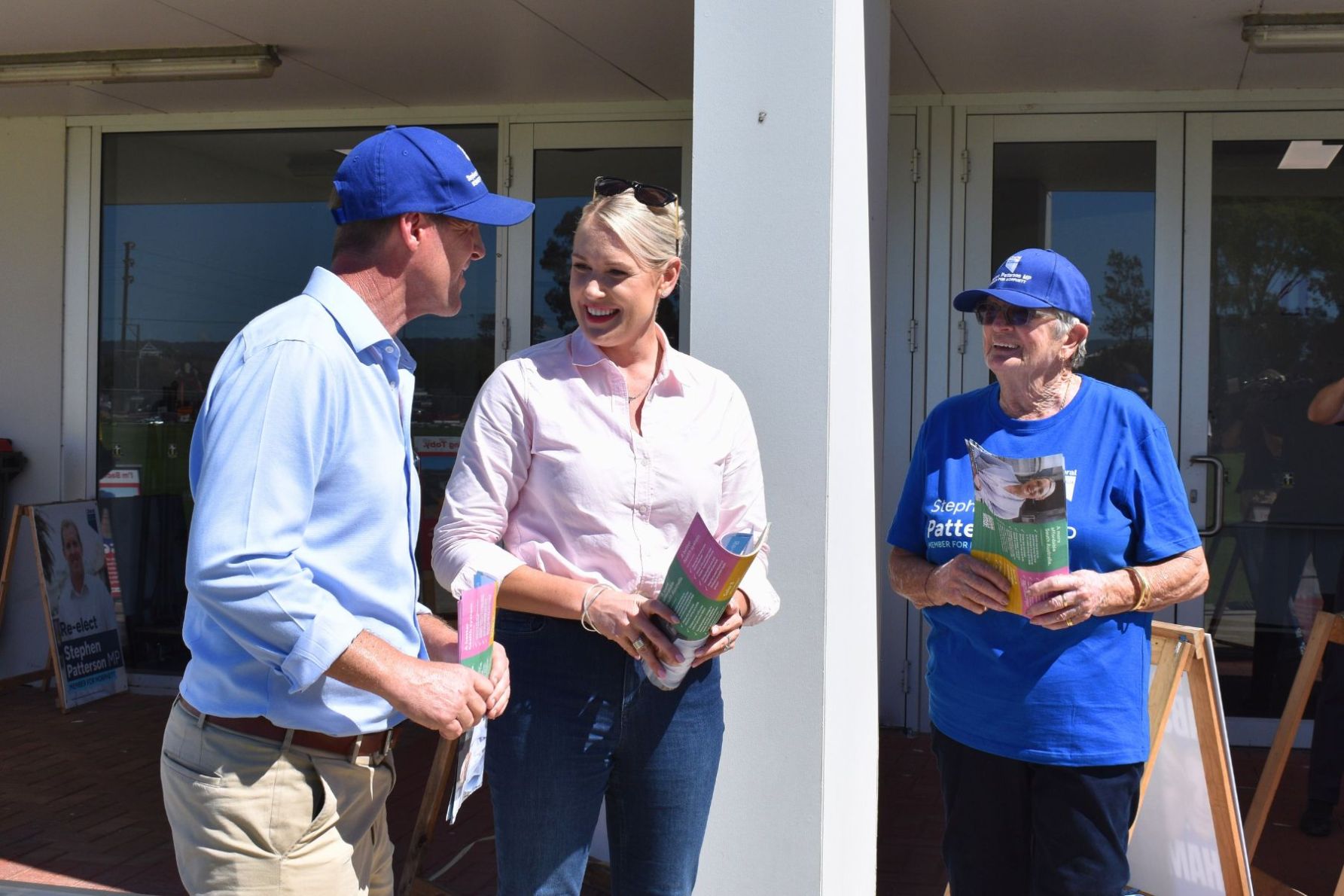 Morphett MP Stephen Patterson, Liberal leader Ashton Hurn and volunteer Jill at Immanuel College polling booth. This picture: Helen Karakulak/InDaily