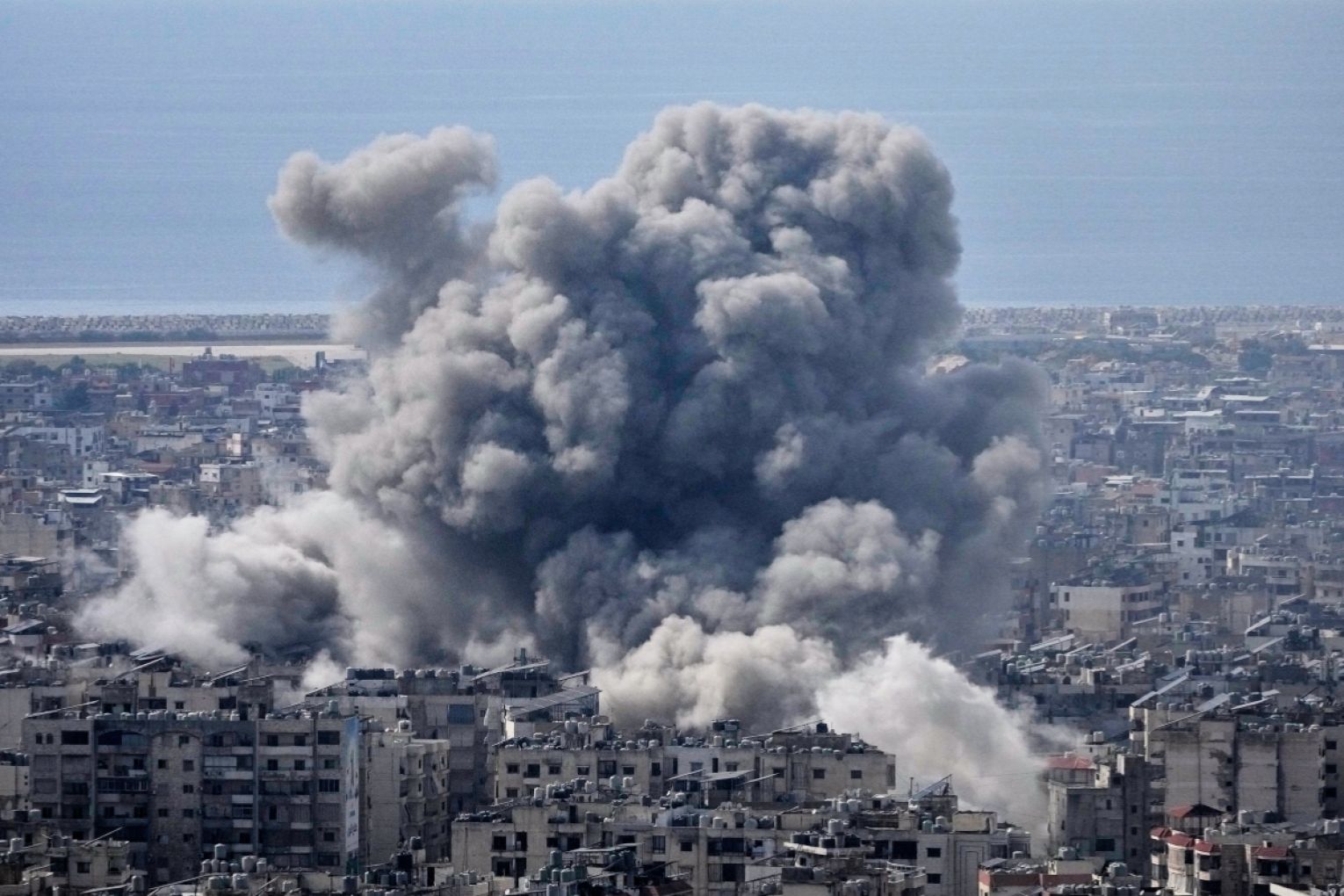 Smoke rises following an Israeli airstrike in Dahiyeh, Beirut's southern suburbs. Photo: AAP