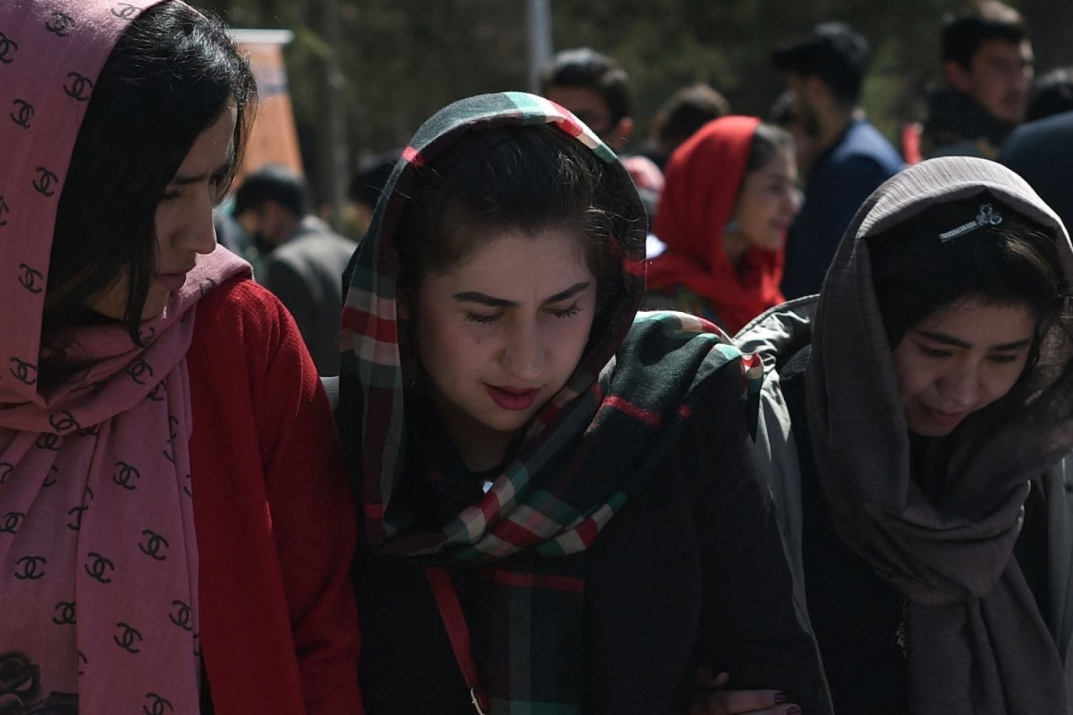 Visitors browse through a book stall on International Women’s Day at Kabul University in 2020, before the return of the Taliban. Wakil Kohsar/Getty Images